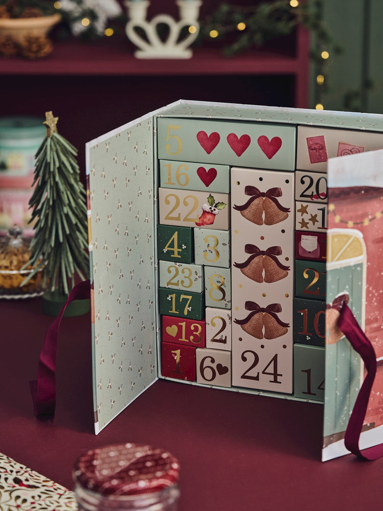Advent calendar with ribbon closure